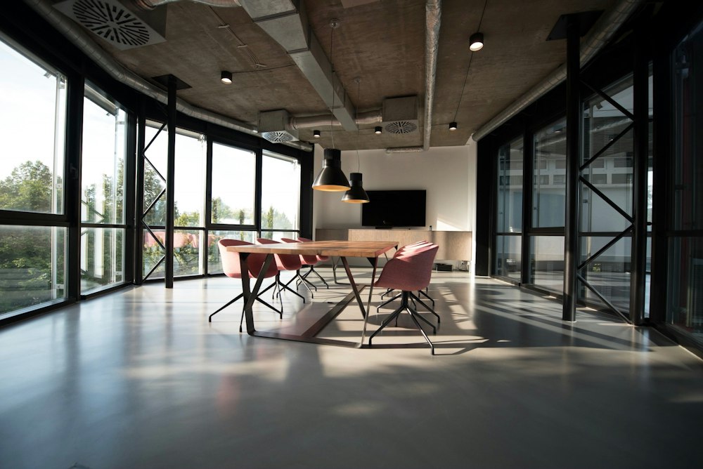 Stylish shared apartment with a communal table and warm natural light